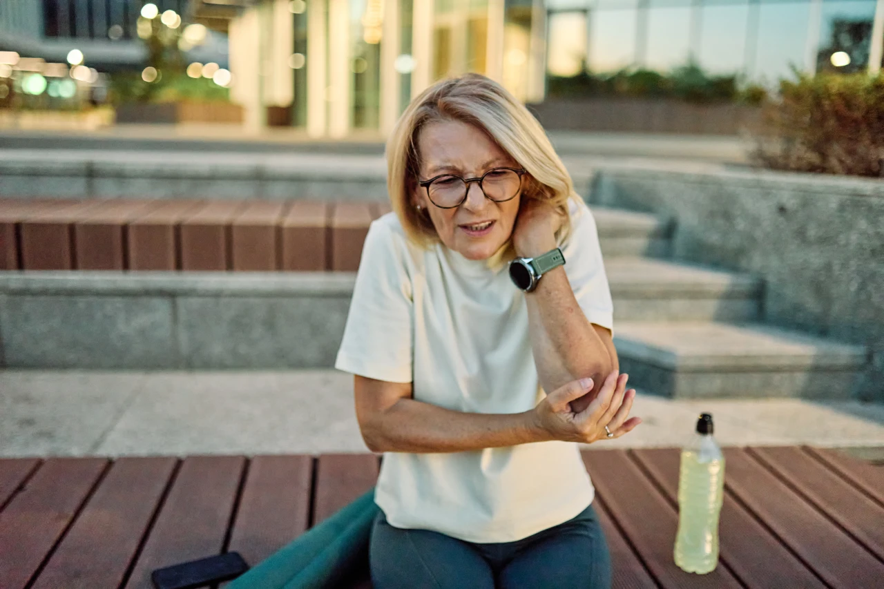 Woman experiencing bone pain due to bone loss, strength training can help prevent osteoporosis